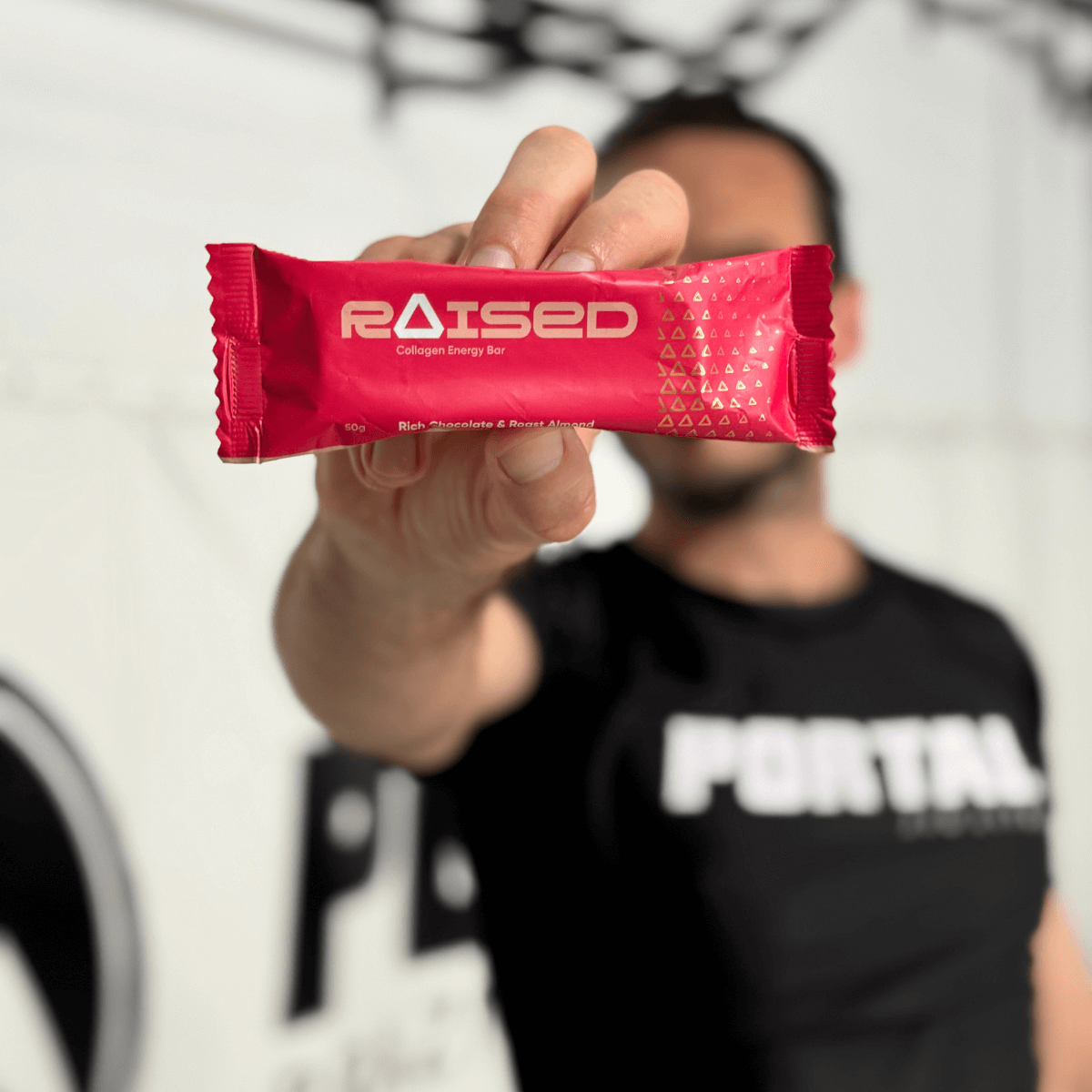 Raised Raw Cacao & Roast Almond Collagen Energy Bar packaging